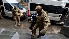Moscow attack suspects dragged into court