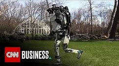 Humanoid robot runs through the park by itself