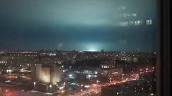 Green and yellow flashes light up the skies above Russian cities