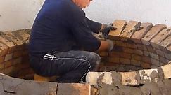 Construction of a traditional brick oven.