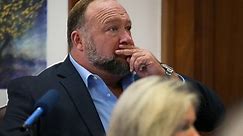 Alex Jones learns on witness stand that lawyers sent his text messages to rival attorney