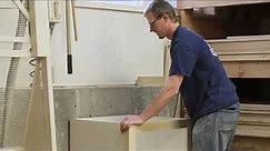 How to Attach a Kitchen Cabinet to Concrete Walls