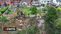 Homeowners left 'living on the edge of a cliff' after giant landslide destroys gardens