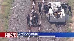 Standoff next to railroad tracks in Weld County ends, police pull driver out of truck