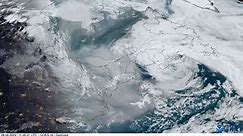 Satellite photos show US East Coast engulfed by smoke from Canadian wildfires