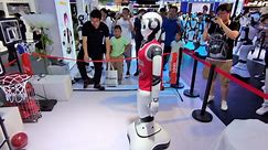 Human-like Intelligent Service Robo Plays Basketball at The 2023 WAIC in Shanghai