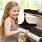Girl Playing a Piano