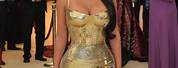 Kim Kardashian Gold Outfit