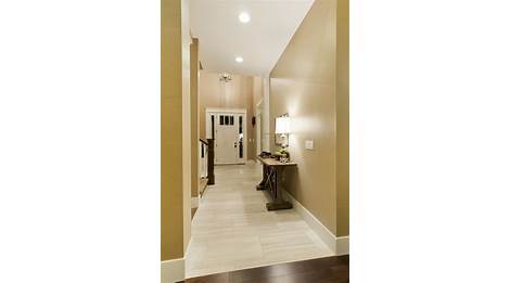 Best 57 Tiled Entryway With Darker Wood Floor Adjacent In