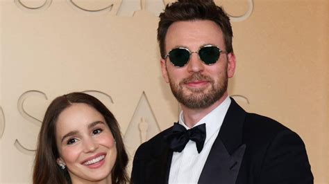Chris Evans and Alba Baptista charm fans with a rare red carpet ...