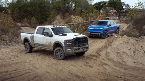 2026 Chevrolet Silverado EV Trail Boss vs. 2025 Ram 2500 Power Wagon ...