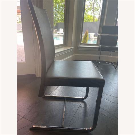 Roche Bobois Amplitude Dark Gray Leather Dining Chairs - AptDeco