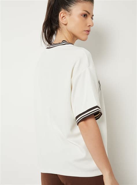 Buy Women Printed Boxy Fit Sports T-shirt Online at just Rs. 799.0 ...