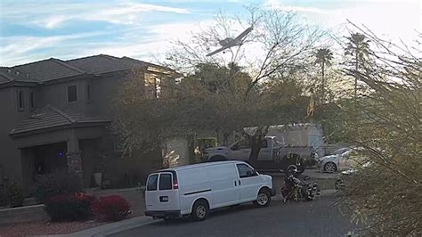 Small plane carrying two crashes into two Phoenix homes