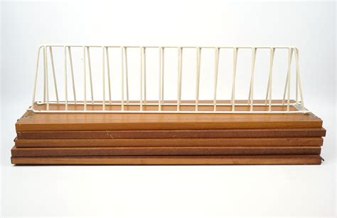 Stringhylla, 5-plan, teak/metall. | Auktion