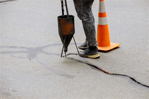 Can I Do Infrared Repairs and Asphalt Crack Sealing in the Winter? - Coatings, Inc.