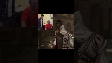 Showing dad how to play Assassin's Creed