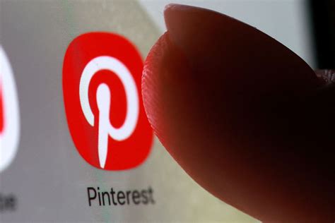 Pinterest cuts up to 15% jobs to prioritize AI push, shares sink ...
