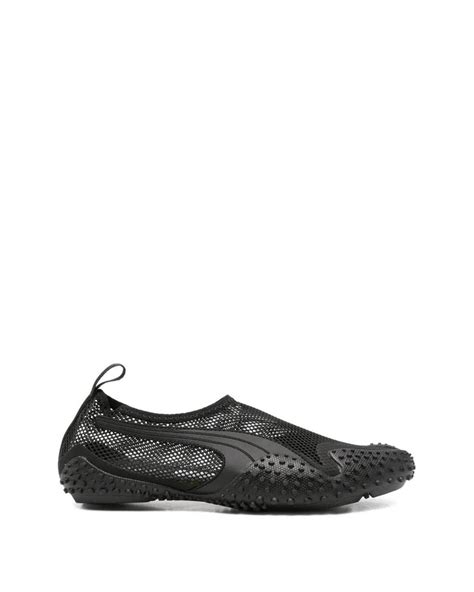 PUMA Mostro Flex Round-Toe Sneakers in Black | Lyst UK