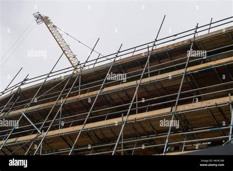 Scaffolding around building during hi-res stock photography and images ...