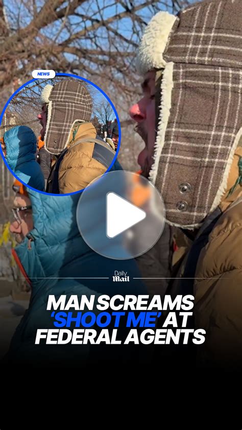 Protester screams "shoot me" at federal agents in Minneapolis after ...