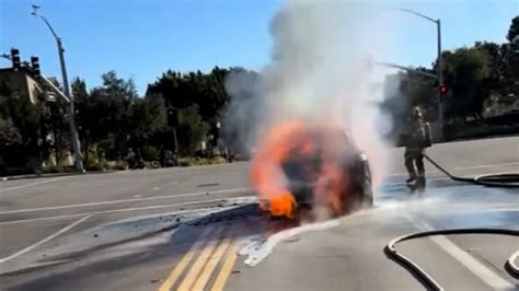 Electric vehicle fire breaks out at intersection in Irvine, California