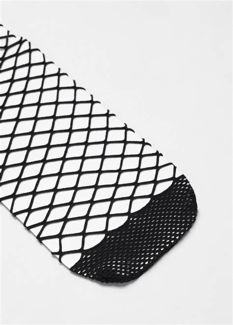 Fishnet tights - Women | MANGO OUTLET United Kingdom