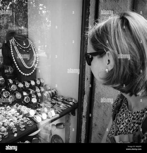 Looking at jewellery Black and White Stock Photos & Images - Alamy