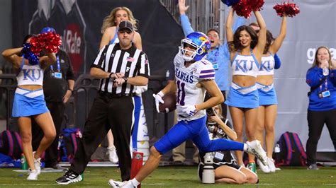 Bean throws for 6 TDs, Kansas overcomes flags to beat UNLV 49-36 in Guaranteed Rate Bowl | The Hill