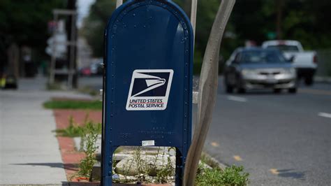 Download USPS Mailbox By Road Wallpaper | Wallpapers.com