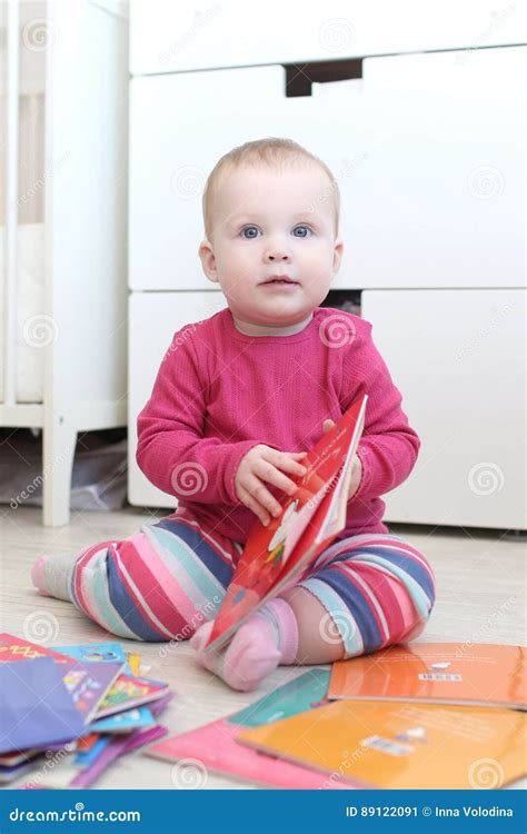 Cute 10 Months Baby Girl with Books at Home Stock Image - Image of ...