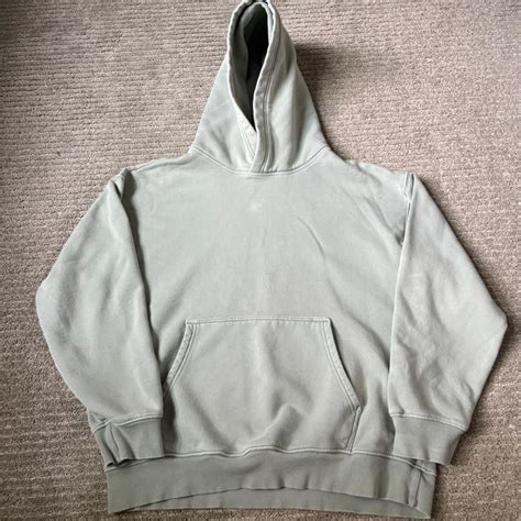 TNA light green hoodie size L (minor flaws shown) - Depop