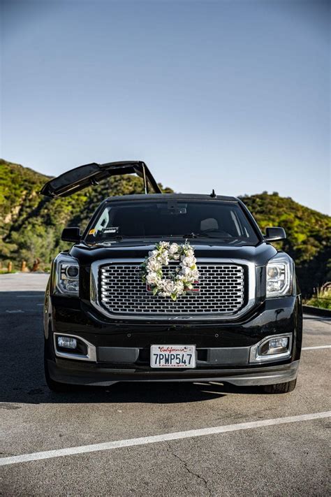 Black GMC Denali Limousine |15 Passenger SUV