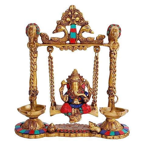 Kartique Brass Ganesh Bhagwan Jhula with Two Diyas Ganesha Idol Swing ...