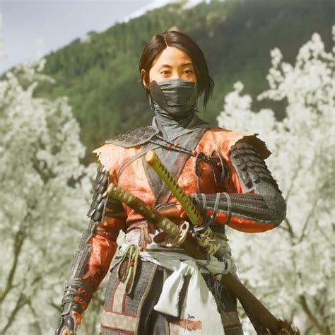 Player character Atsu looks down over a beautiful vista in Ghost of Yotei.