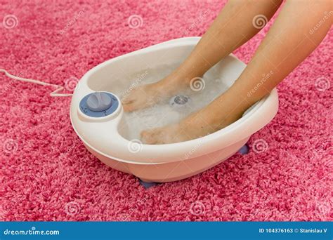 Female Feet in a Vibrating Foot Massager Home Stock Image - Image of ...
