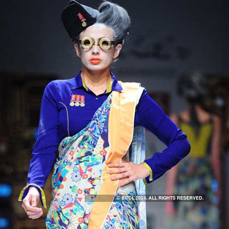Model showcases a creation by fashion designer Nida Mahmood on Day 5 of ...