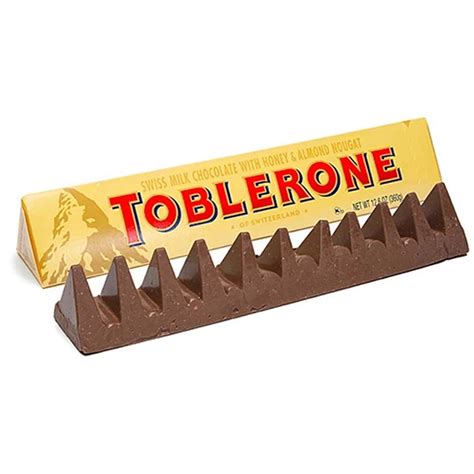 Send Sneh Designer Stone Rakhi with Toblerone Chocolate Online