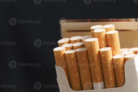 peel it off Cigarette pack prepare smoking on white wooden background ...