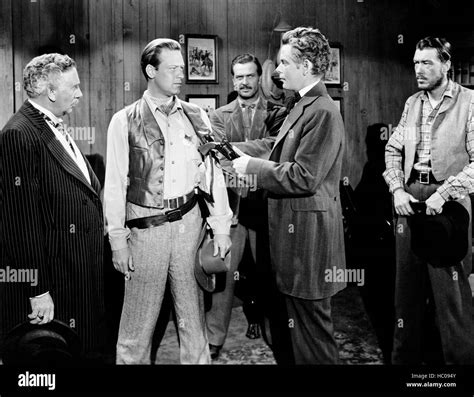 THE MAN FROM COLORADO, from left: Ray Collins, William Holden, David ...