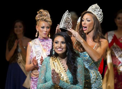 Mrs. Universe won't back down on Harper criticism