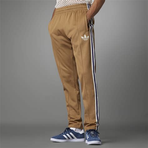 adidas Adicolor 70s Striped Track Pants - Brown | adidas SA