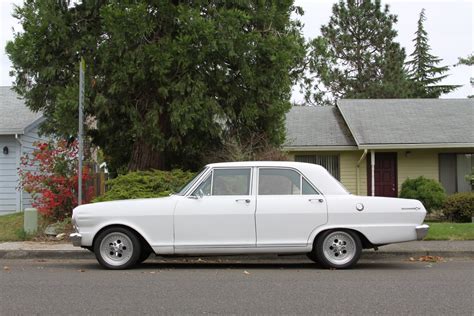 OLD PARKED CARS.: 1965 Chevy II Nova.