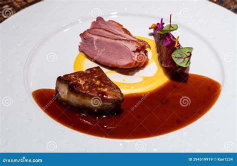 Roasted Duck Breast, Seared Foie Gras with Red Wine Sauce Stock Image ...