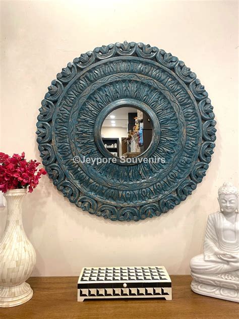 Hand carved Blue colored wooden round wall mirror – Jeypore Souvenirs