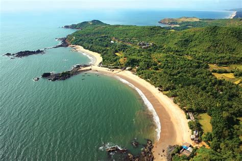 https://karnatakatourism.org/_next/image/?q=75&url=https%3A%2F%2Fweb-cms.karnatakatourism.org%2Fwp-content%2Fuploads%2F2025%2F09%2FOm-Beach-1-scaled.jpg&w=828
