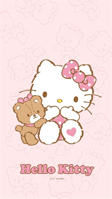 a hello kitty wallpaper with a teddy bear