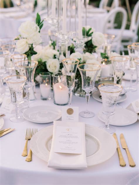 Elegant White Wedding Place Setting with Gold Flatware