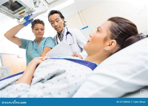 Medical Team Preparing Patient for Xray Stock Photo - Image of adult ...