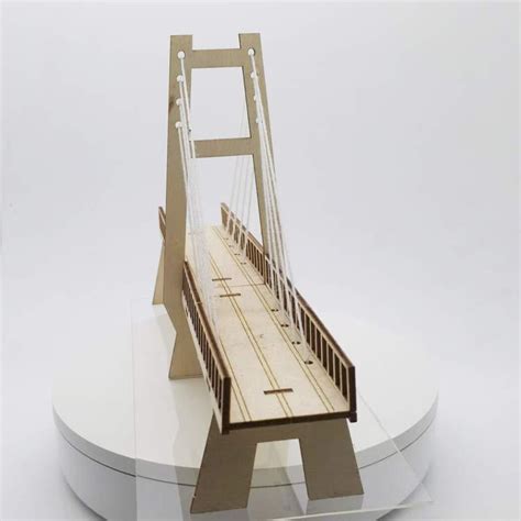 废纸板制作的桥（图解）_环保手工_巧巧手幼儿手工网